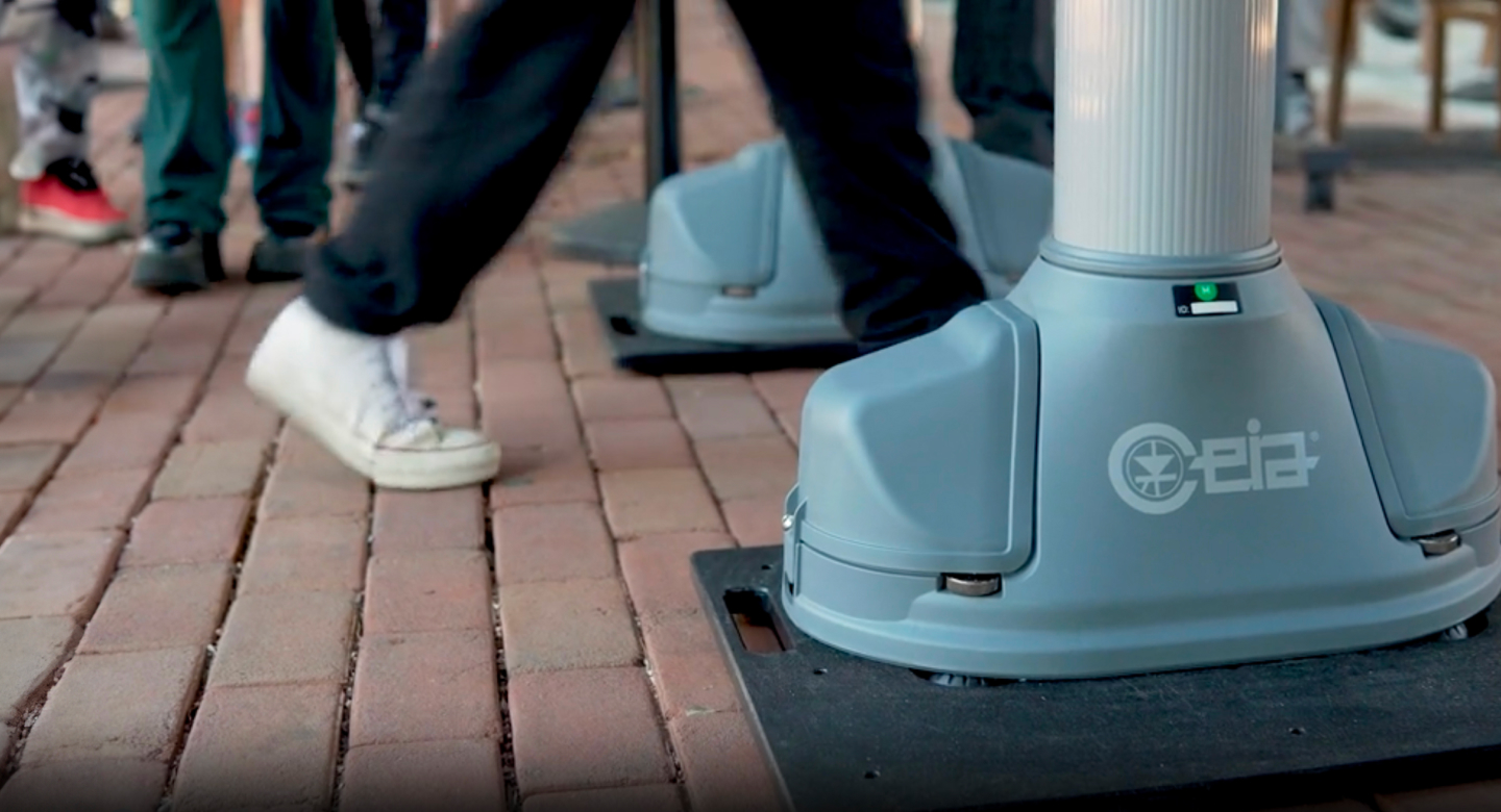 Hero Image showing CEIA Product and students walking through it