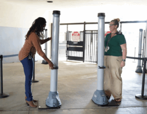 Teachers setting up OPENGATE at school entrance.